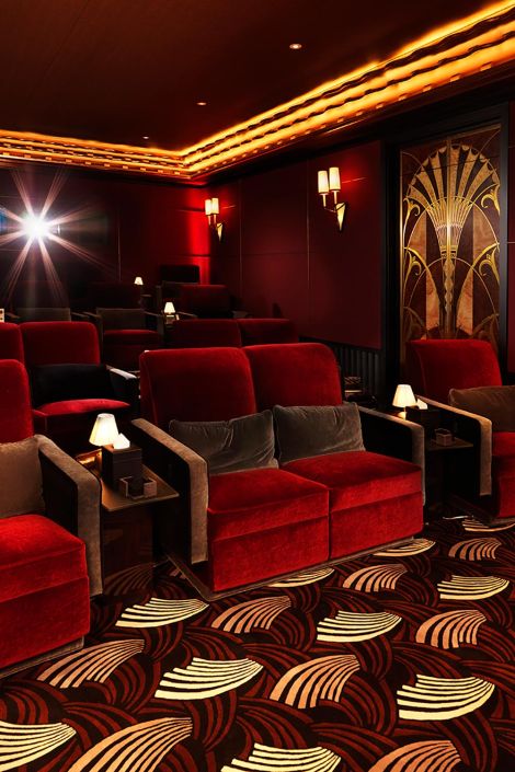 Red and brown home theater seating with art deco decoration
